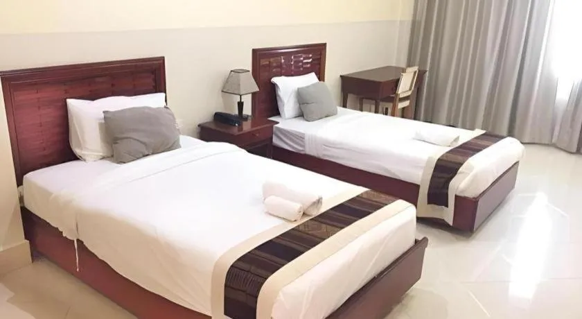 Bed in New Rose Boutique Hotel