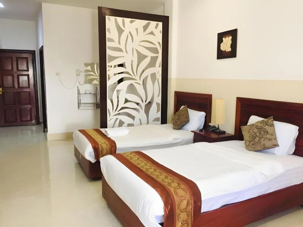 Bed in New Rose Boutique Hotel