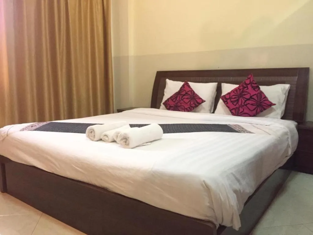 Bed in New Rose Boutique Hotel