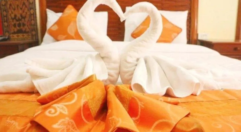 Bed in New Rose Boutique Hotel