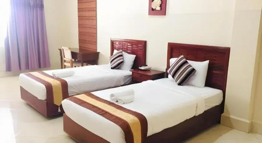 Bed in New Rose Boutique Hotel Bed in New Rose Boutique Hotel