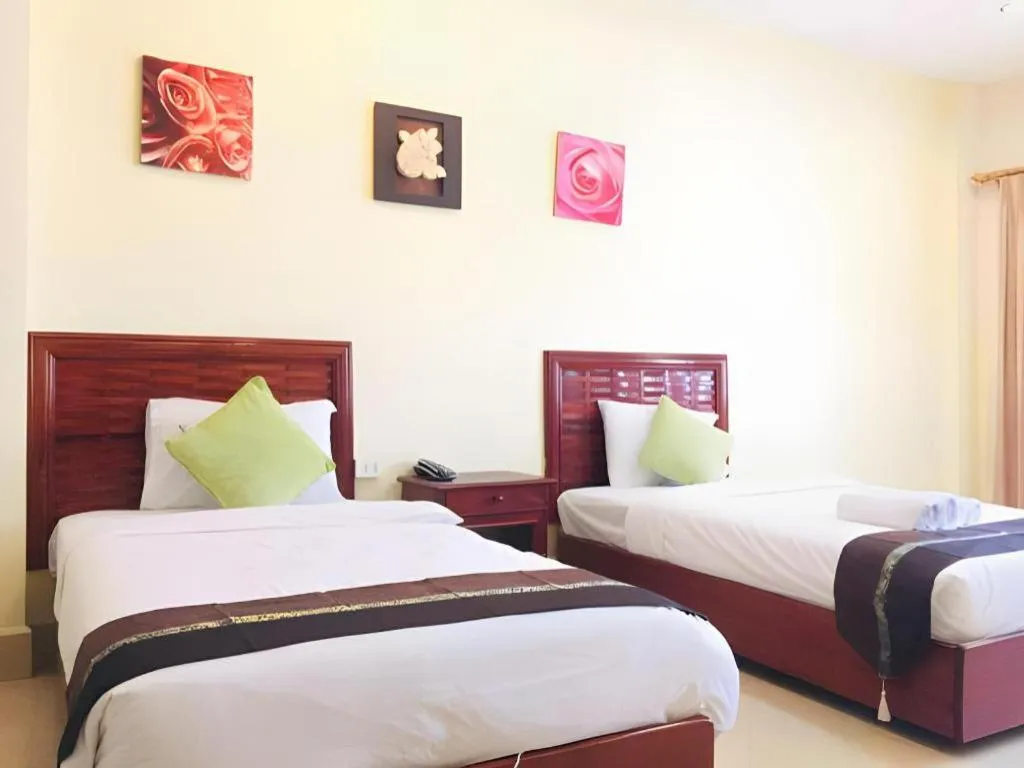 Bed in New Rose Boutique Hotel