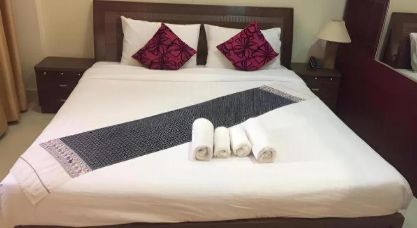 Bed in New Rose Boutique Hotel