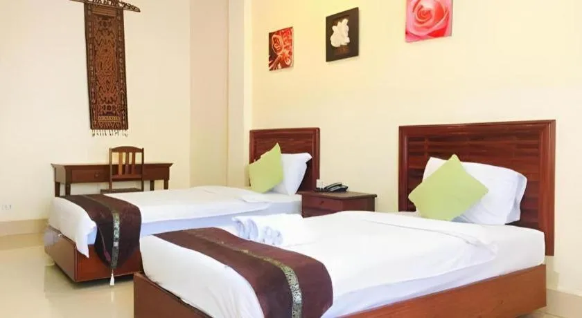 Bed in New Rose Boutique Hotel