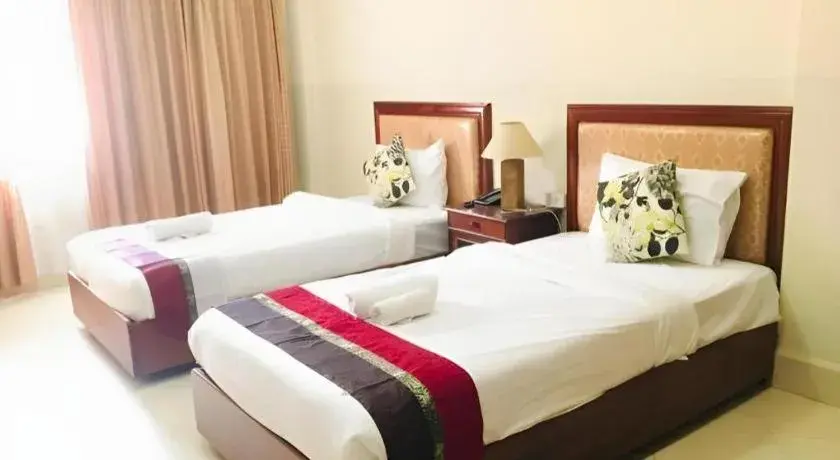 Bed in New Rose Boutique Hotel Bed in New Rose Boutique Hotel