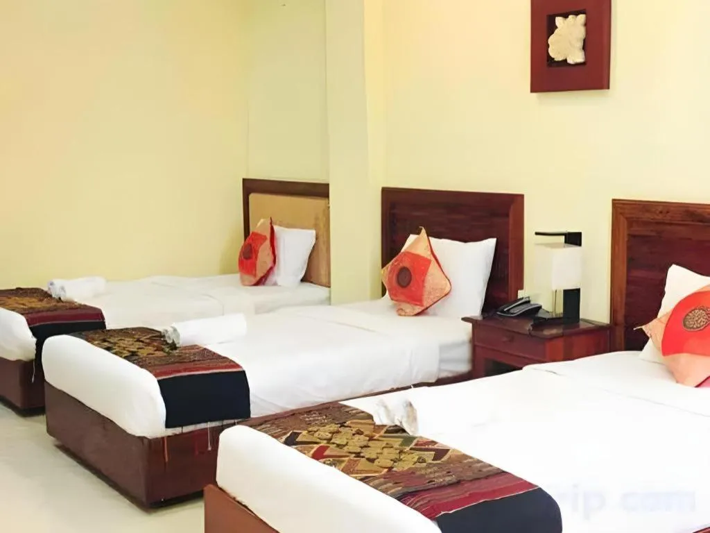 Bed in New Rose Boutique Hotel