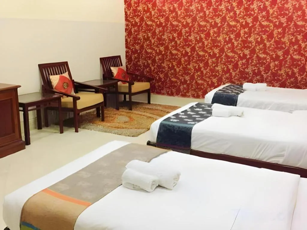 Bed in New Rose Boutique Hotel