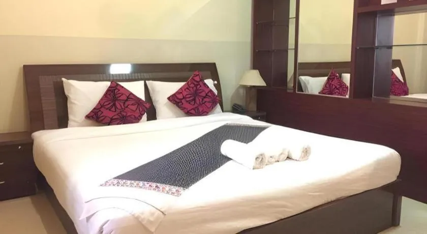 Bed in New Rose Boutique Hotel