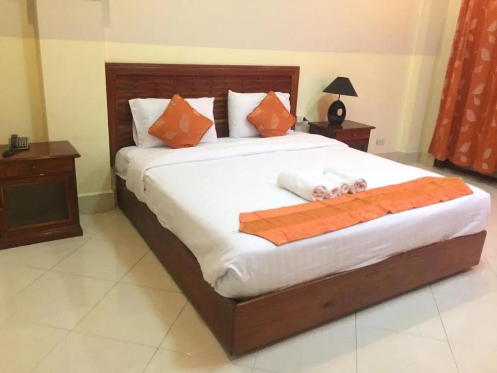 Bed in New Rose Boutique Hotel