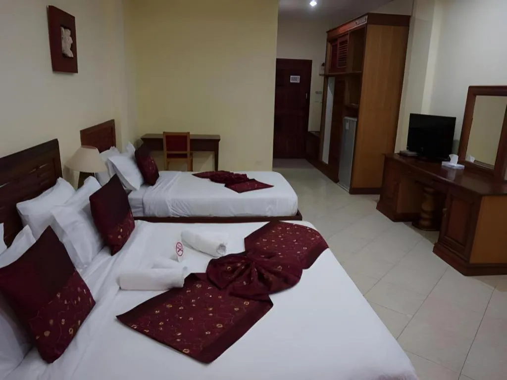 Bed in New Rose Boutique Hotel