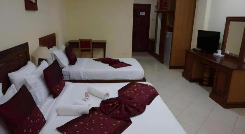 Bed in New Rose Boutique Hotel