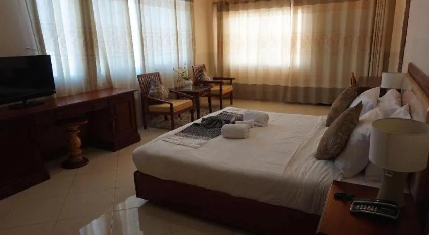 Bed in New Rose Boutique Hotel