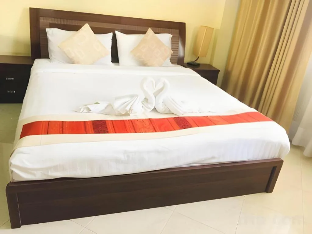 Bed in New Rose Boutique Hotel