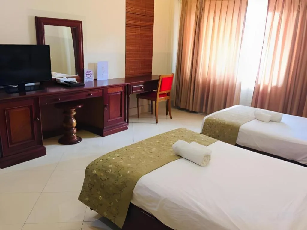 Bed in New Rose Boutique Hotel