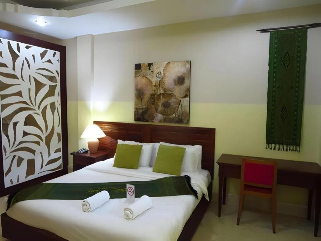 Bed in New Rose Boutique Hotel