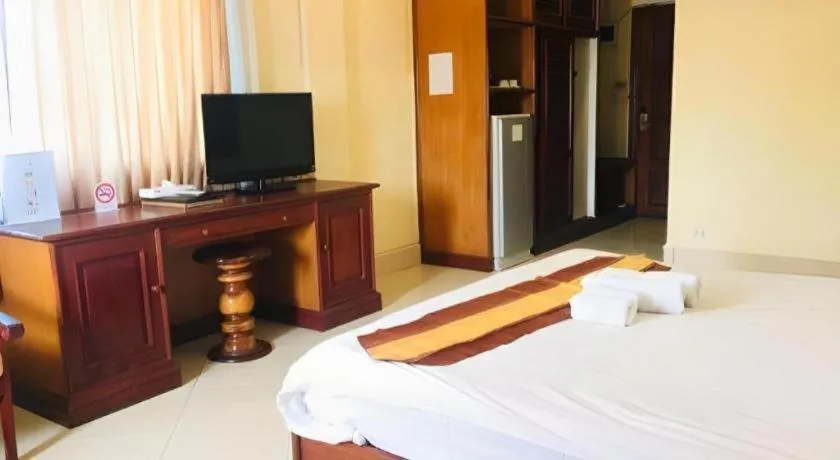 Bed in New Rose Boutique Hotel