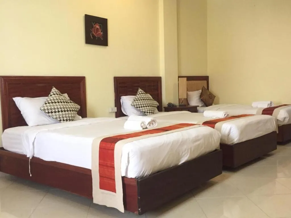 Bed in New Rose Boutique Hotel