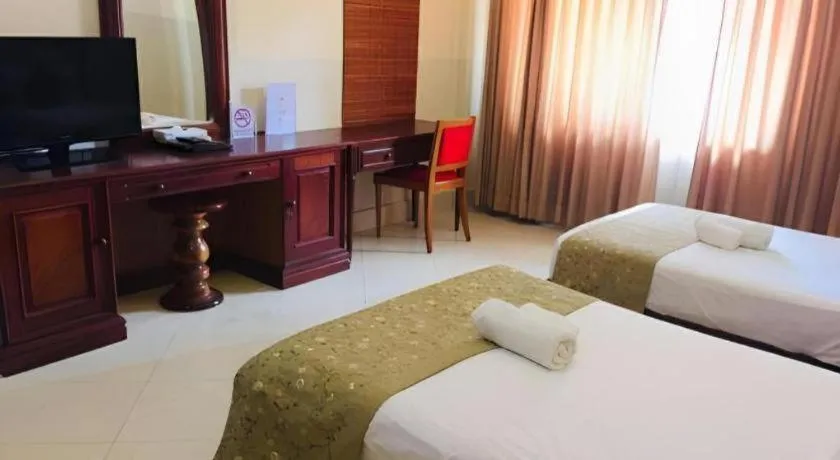 Bed in New Rose Boutique Hotel