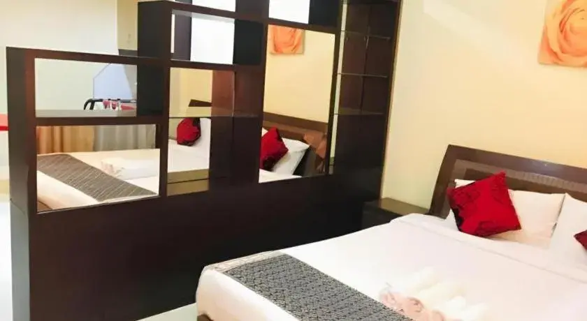 Bed in New Rose Boutique Hotel Bed in New Rose Boutique Hotel