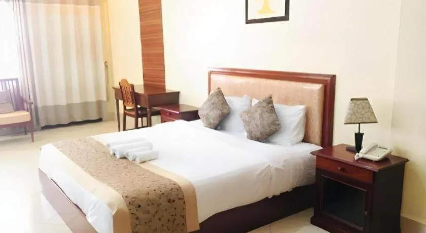 Bed in New Rose Boutique Hotel