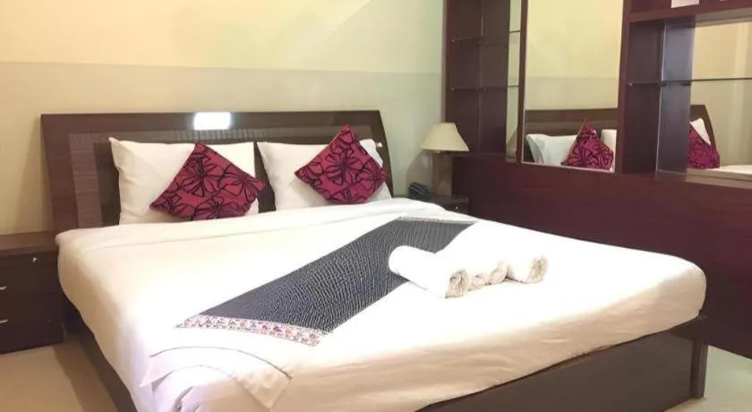 Bed in New Rose Boutique Hotel