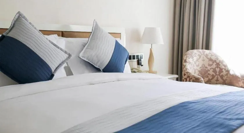 Bed in Xian Qujiang Yinzuo Hotel