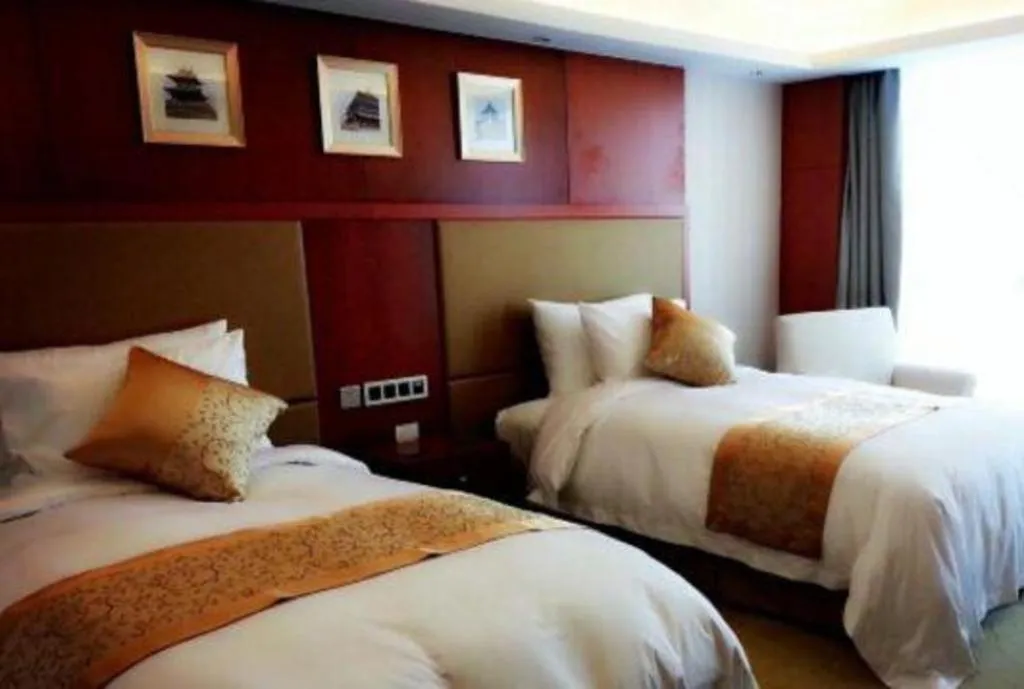 Bed in Xian Qujiang Yinzuo Hotel