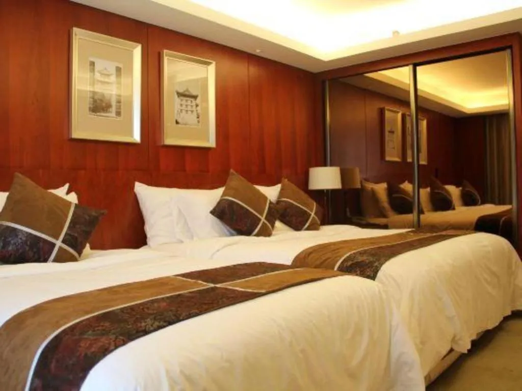 Bed in Xian Qujiang Yinzuo Hotel