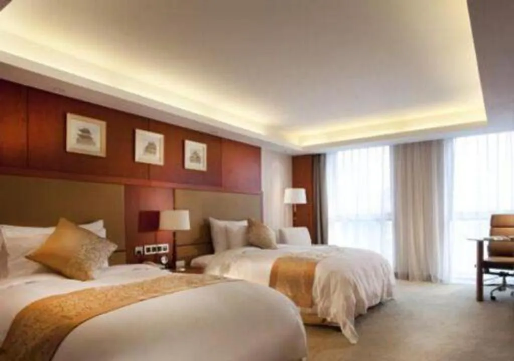 Bed in Xian Qujiang Yinzuo Hotel