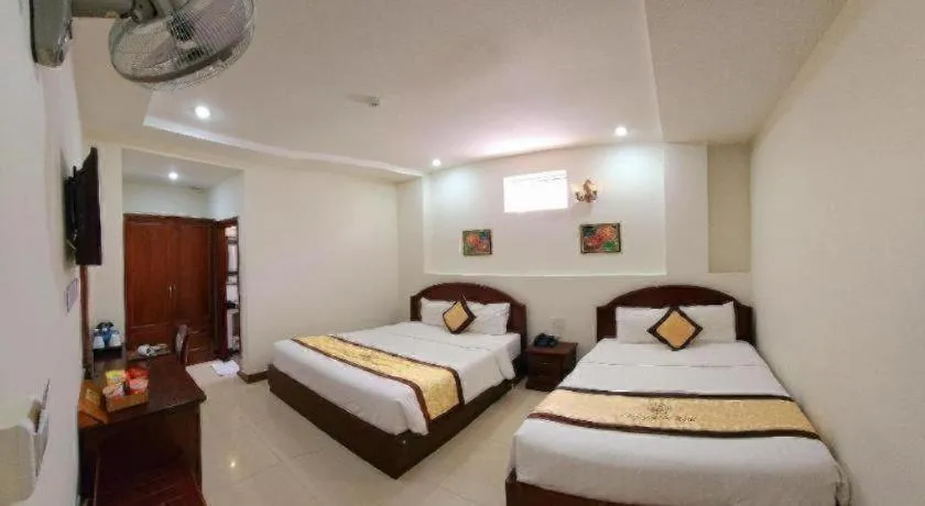 Bed in Marguerite Hotel