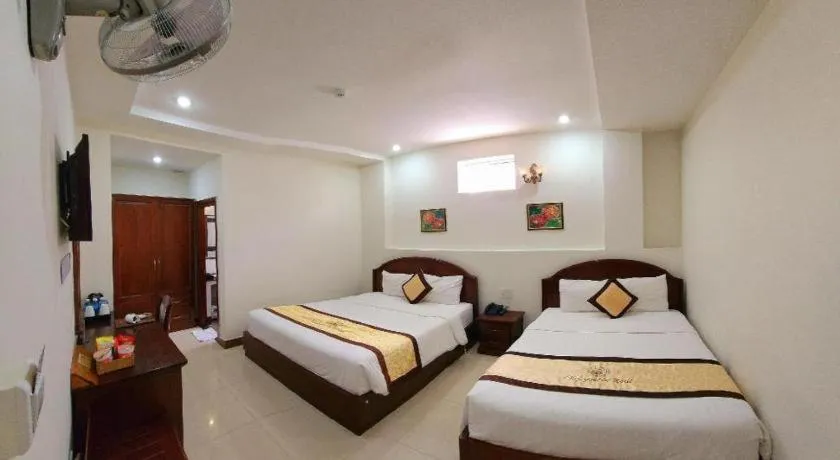 Bed in Marguerite Hotel