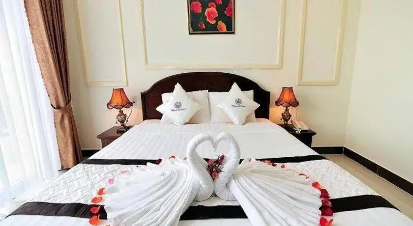 Bed in Marguerite Hotel Bed in Marguerite Hotel