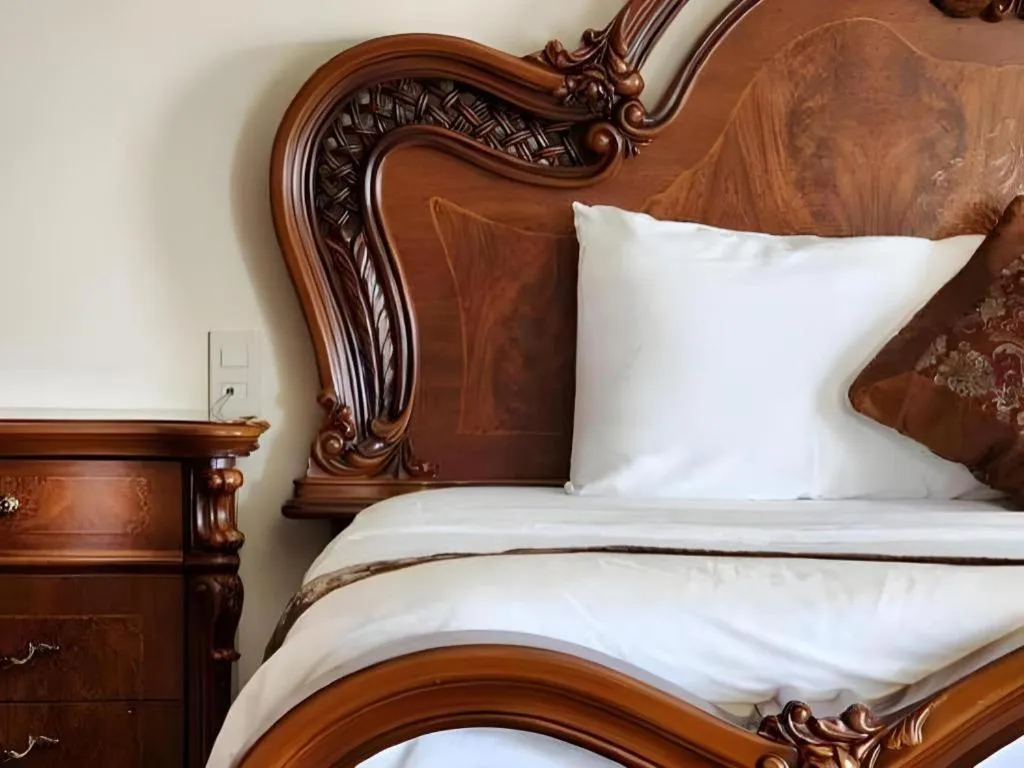 Bed in Marguerite Hotel