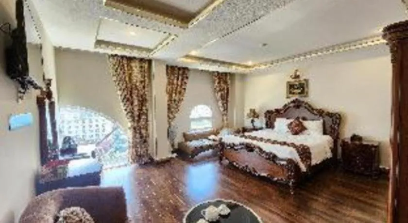 Bed in Marguerite Hotel