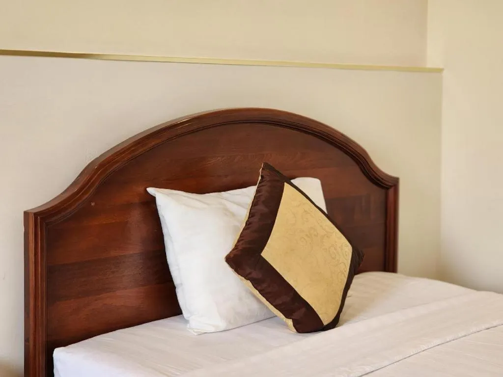 Bed in Marguerite Hotel