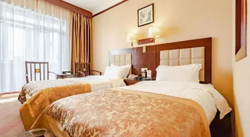 Bed in Lanzhou Hualian Hotel Bed in Lanzhou Hualian Hotel