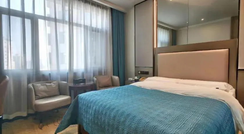 Bed in Lanzhou Hualian Hotel Bed in Lanzhou Hualian Hotel