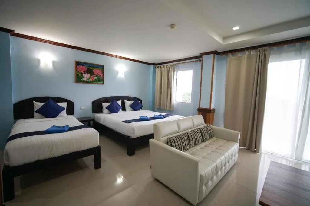 Bed in Sea Mountain Khanom Hotel