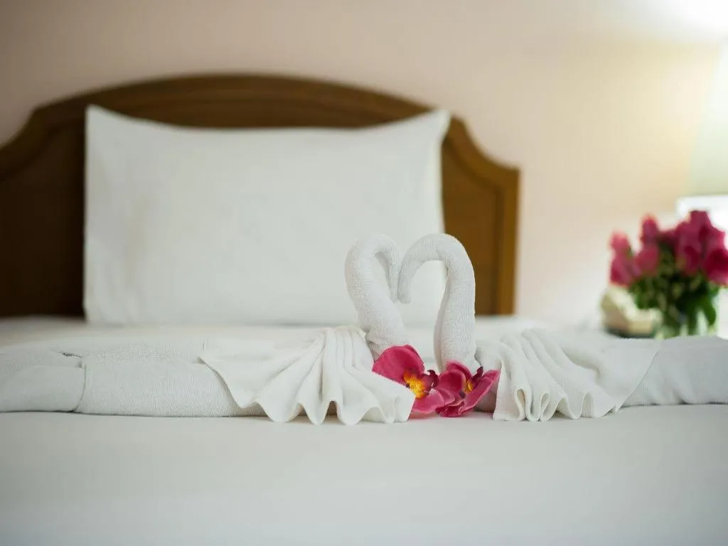 Bed in Grand Plaza Hotel