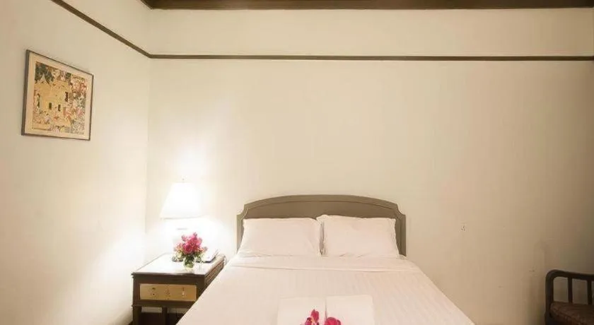 Bed in Grand Plaza Hotel