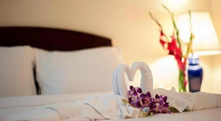 Bed in Grand Plaza Hotel