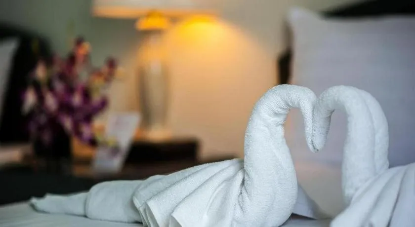 Bed in Grand Plaza Hotel