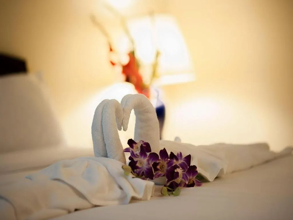 Bed in Grand Plaza Hotel