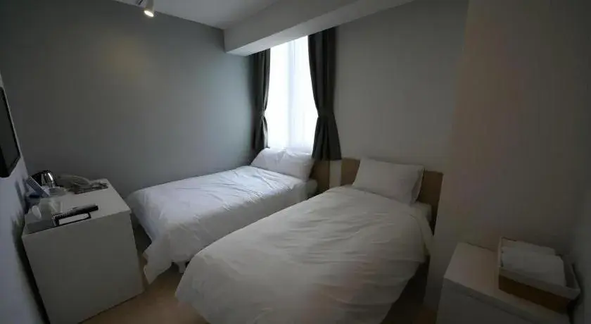 Bed in Wons Ville Myeongdong Hotel Bed in Wons Ville Myeongdong Hotel
