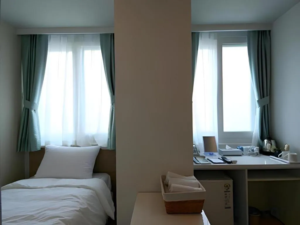 Bed in Wons Ville Myeongdong Hotel