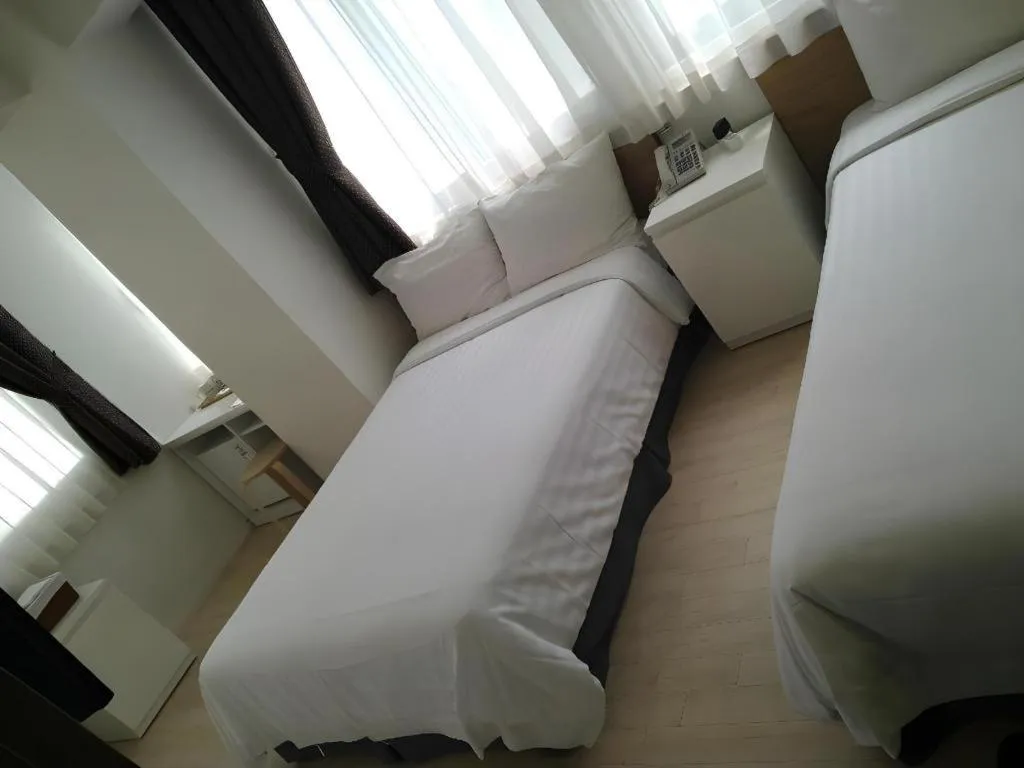 Bed in Wons Ville Myeongdong Hotel