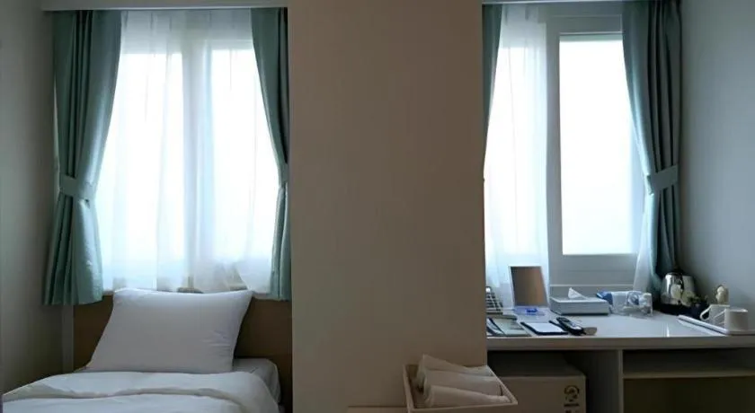 Bed in Wons Ville Myeongdong Hotel