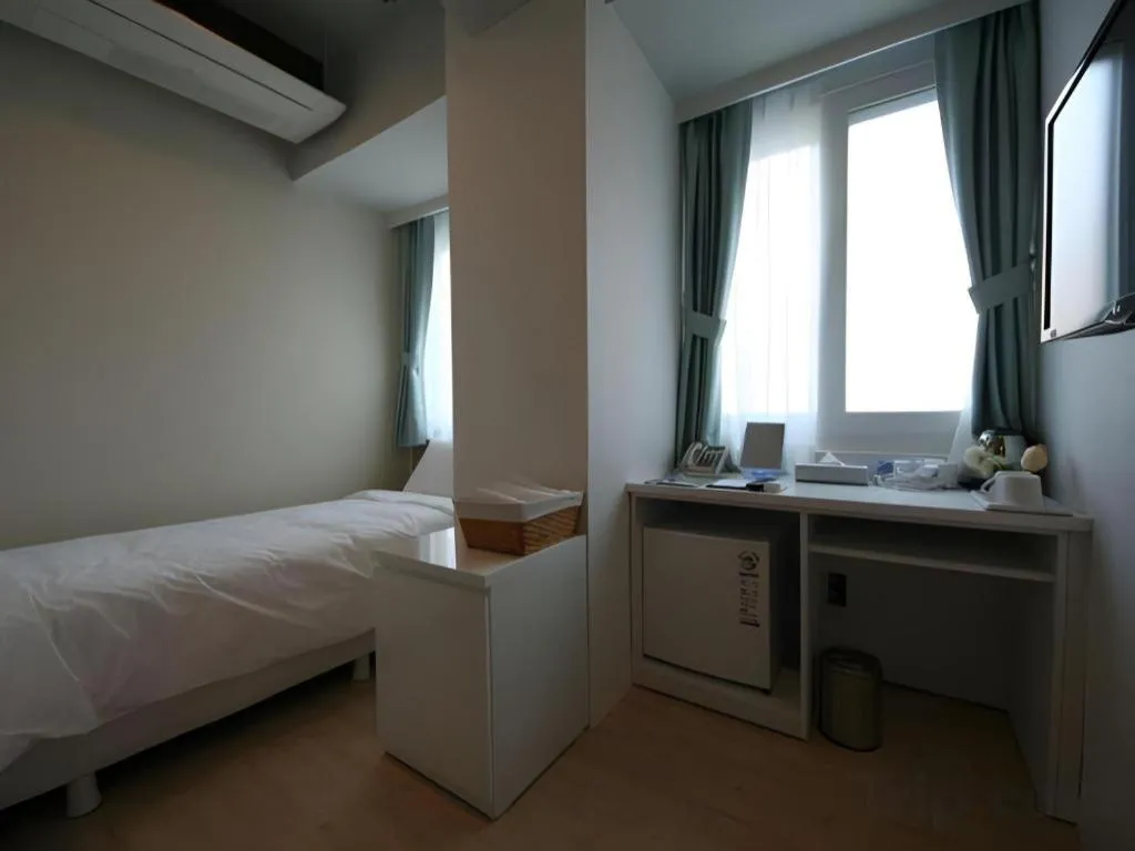 Bed in Wons Ville Myeongdong Hotel