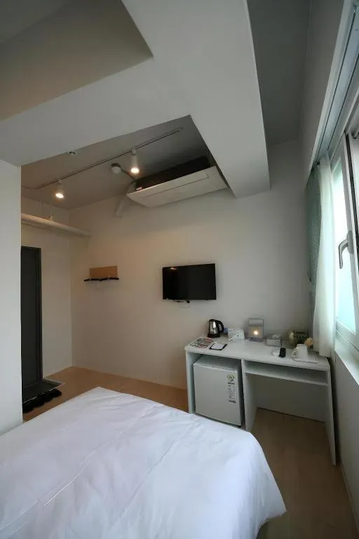Bed in Wons Ville Myeongdong Hotel