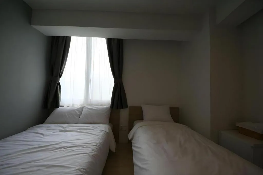 Bed in Wons Ville Myeongdong Hotel